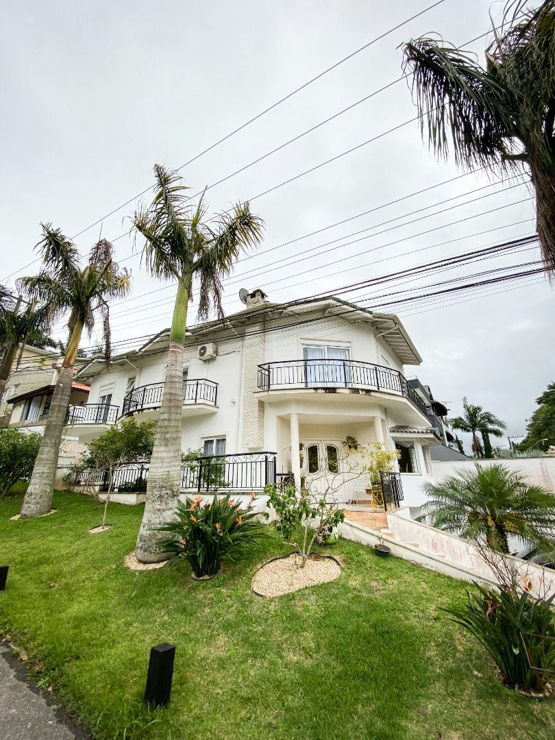 Sobrado em Parque Residencial Itapeti - 381m² | 3 dormitórios | 5 vagas - foto 1